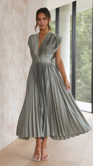 Long dress with deep V-neck and bow on the back