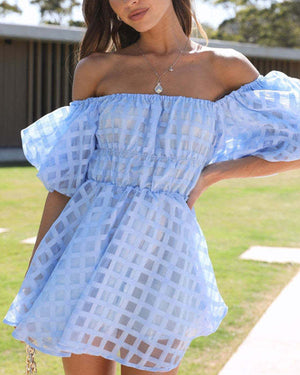 Mini dress with puffed sleeves and a checkered print