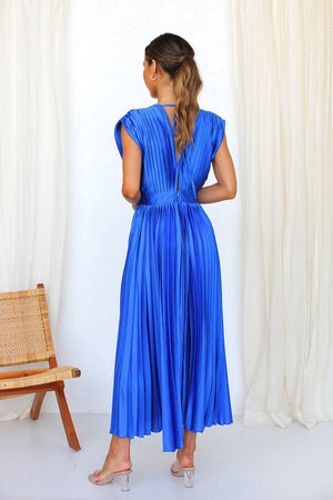 Long dress with deep V-neck and bow on the back