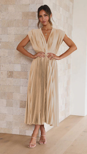 Long dress with deep V-neck and bow on the back