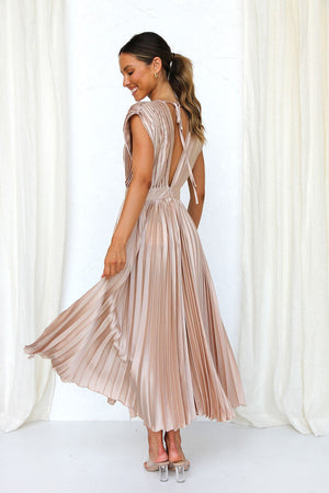 Long dress with deep V-neck and bow on the back