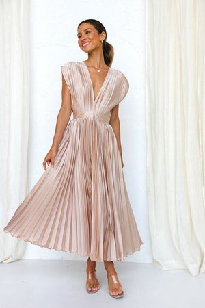 Long dress with deep V-neck and bow on the back