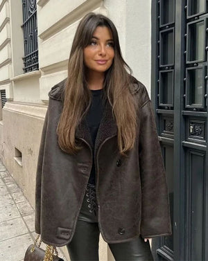 Coat in synthetic shearling and leather